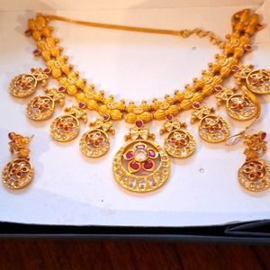 22 carat gold plated Tarnika neclace set.